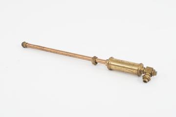Upright copper pipe and cylindrical vessel