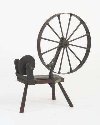 Wooden loom bobbin winder.