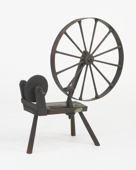 Wooden loom bobbin winder.