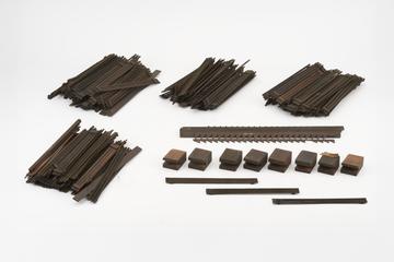 Packings, boards and model supports separated from model