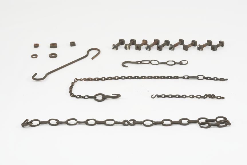 A quantity of bolts and nuts and chain