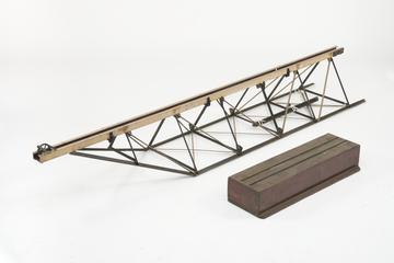 Triangular lattice girder with a pulley wheel and wooden block with rails