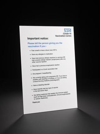 NHS COVID-19 symptoms and allergens sign