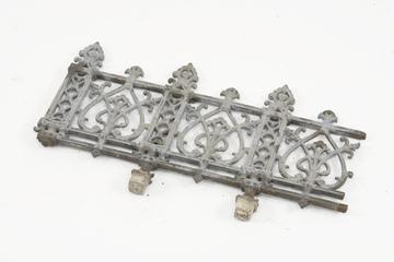 Cast iron railing with two fixing points and third broken off
