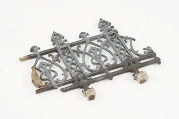 Cast iron railing, broken both ends and concrete one side