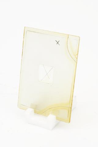 Glass screen marked with Xs