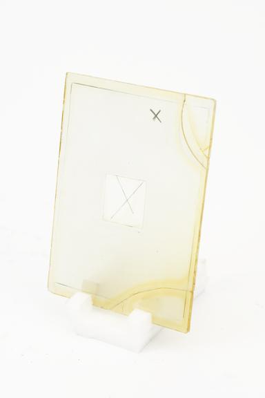 Glass screen marked with Xs