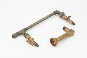 A pair of bronze drain or indicator cocks