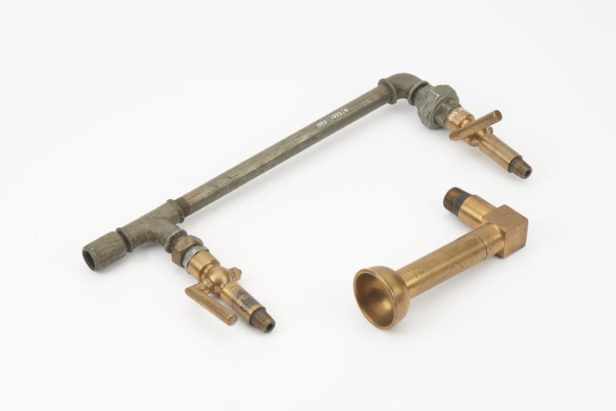 A pair of bronze drain or indicator cocks