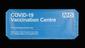Sign for Science Museum's COVID-19 vaccination centre