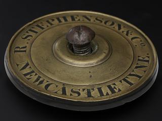 Works plate from wheel of Robert Stephenson's 0-2-2 locomotive 'Rocket'