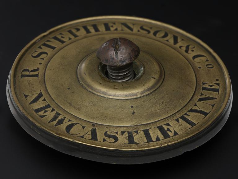 Works plate from wheel of Robert Stephenson's 0-2-2 locomotive 'Rocket'