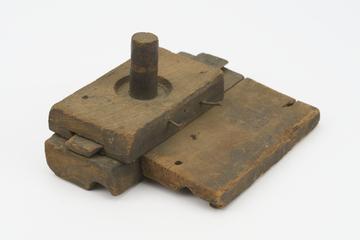Wooden section of 'rose-engine" lathe on a sliding bar