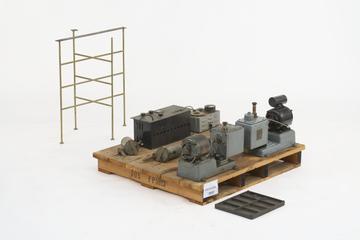 Pallet of components including two vacuum pumps and other components from mass spectrometer
