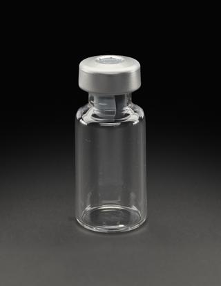Glass vial from University of Oxford's Clinical BioManufacturing Facility