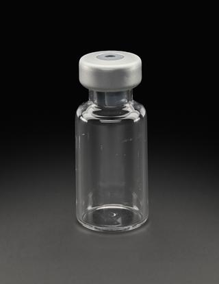 Glass vial from University of Oxford's Clinical BioManufacturing Facility