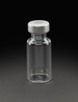 Glass vial from University of Oxford's Clinical BioManufacturing Facility