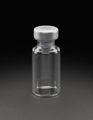 Glass vial from University of Oxford's Clinical BioManufacturing Facility