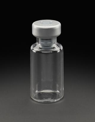 Glass vial from University of Oxford's Clinical BioManufacturing Facility