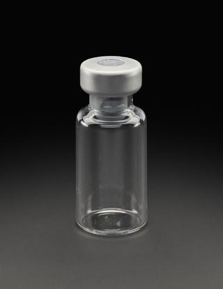 Glass vial from University of Oxford's Clinical BioManufacturing Facility