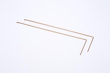 Pair of L-shaped dowsing rods made from copper welding rods