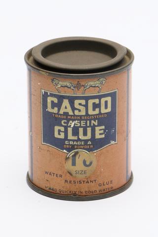 Assorted paint and glue pots, 1950s.