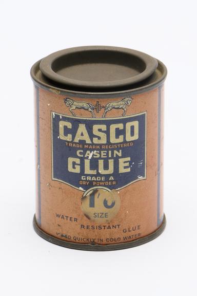 Assorted paint and glue pots, 1950s.