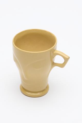 Ceramic mug moulded into the form of a face
