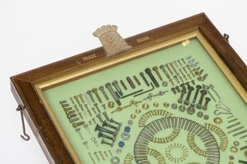 Glass fronted display case of G.K.N. screws