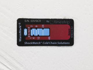 Dry ice shipping cooler with temperature monitor