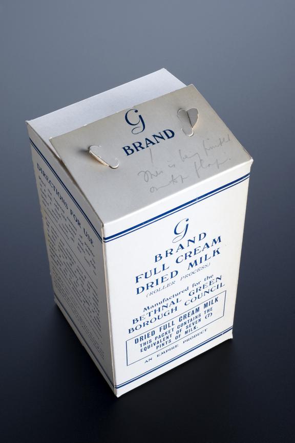 Empty dried milk carton for 'G' Brand full cream milk