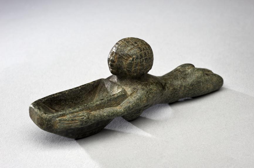 Steatite ointment spoon in form of a diving girl, Egyptian