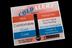Combined hypothermia thermometer and advice card