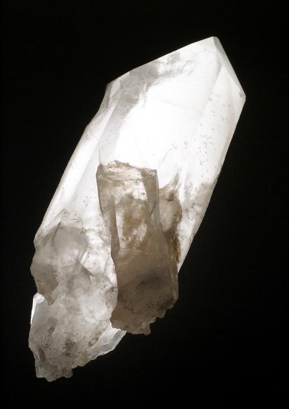 Quartz crystal shaped to form a point at one end. General view